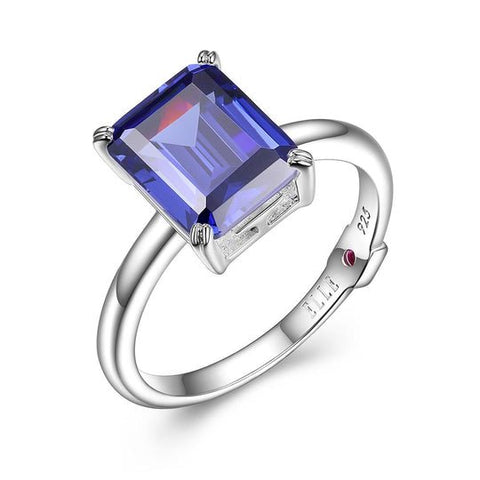 Sterling Silver Ring made of Tanzanite Color CZ (10x8mm), Ring Size 6, Rhodium Plated - Robson's Jewelers